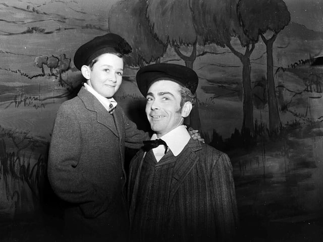 John Young and his son Paul Young (who would go on to become a popular television and film personality) appearing together in the Gateway Theatre play 'Susie Tangles the Strings', in December 1955