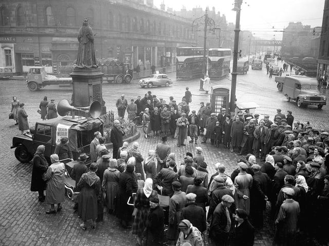 During the 1955 General election campaign, Independent Liberal candidate Sir Andrew Murray addresses people at an open air meeting at Queen Victoria statue at the foot of Leith Walk, in Edinburgh.