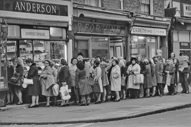 Britons famously need no excuse to queue. It has even been described as a national pastime. People are pictured here queuing patiently for their daily loaf during a strike by bakery workers in December 1974.