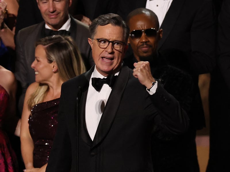 US comedian writer Stephen Colbert accepts the Outstanding Talk Series award for "The Late Show with Stephen Colbert" during the 77th Primetime Emmy Awards.