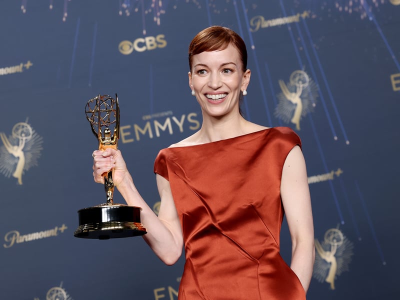 Britt Lower, winner of the Lead Actress in a Drama Series award for "Severance," poses in the press room during the 77th Primetime Emmy Awards.