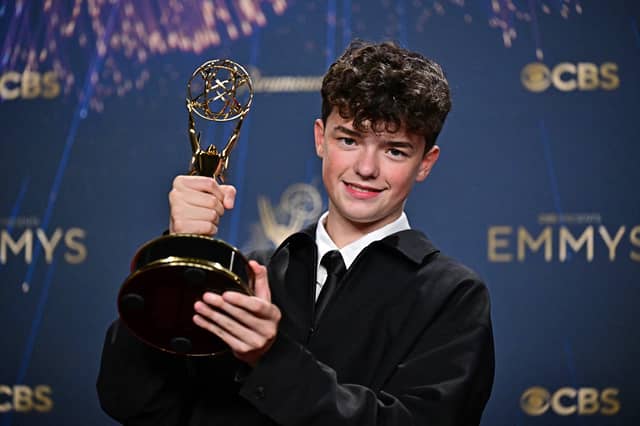 British actor Owen Cooper poses in the press room with the award for Outstanding Supporting Actor in a Limited or Anthology Series or Movie for "Adolescence" during the 77th Primetime Emmy Awards.
