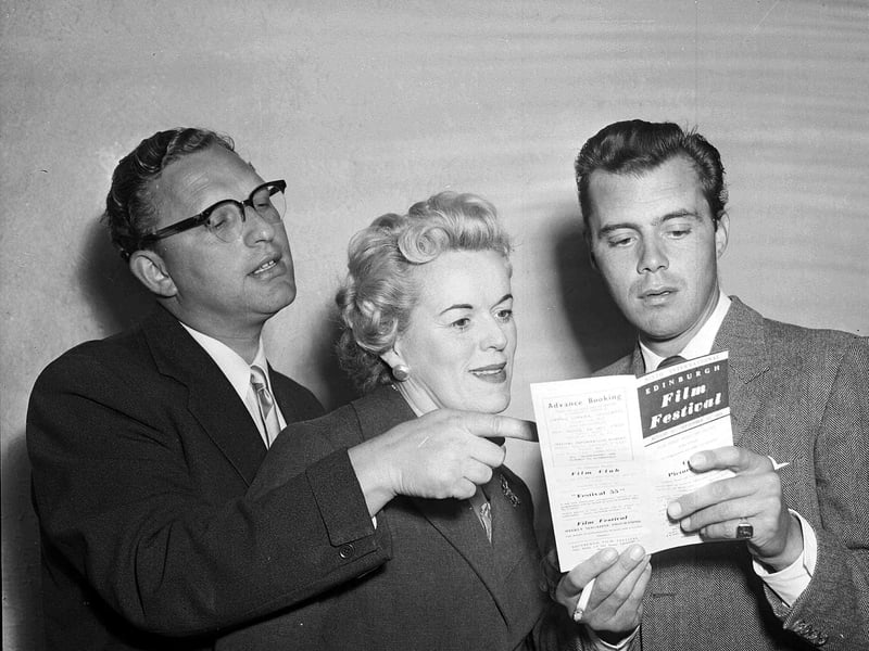 Film director Ralph Thomas and producer Betty Box with actor Dirk Bogarde at Filmhouse during the Edinburgh Film Festival 1955.