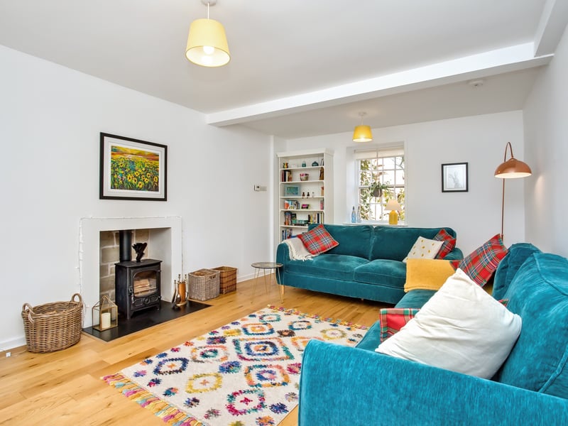 The living room has a wood burning stove.