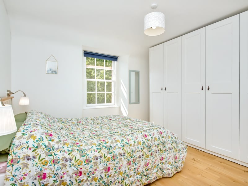 One of the bedrooms has ample built-in storage.