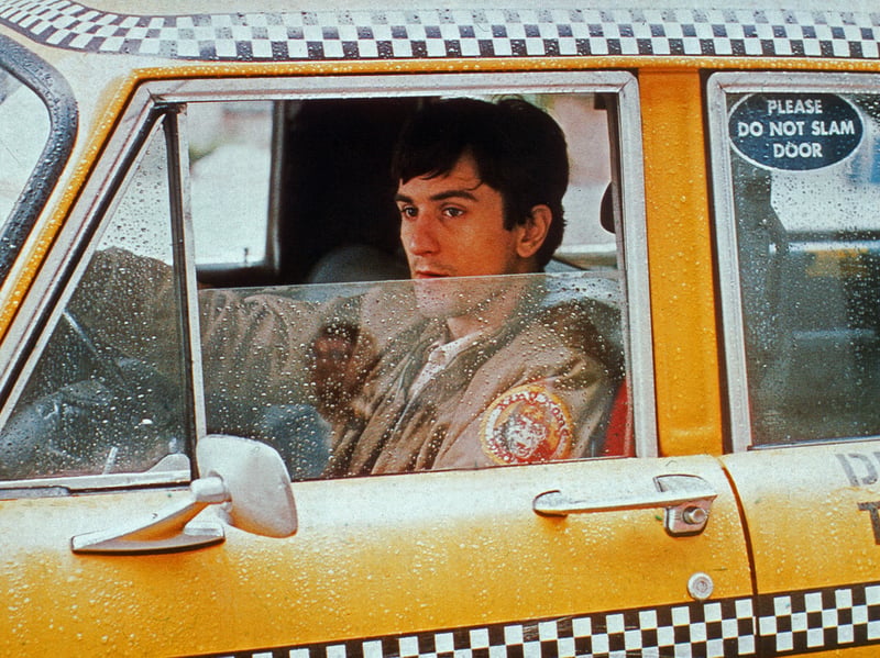 In the 1976 film Taxi Driver, Robert De Niro plays the tortured veteran Marine Travis Bickle, struggling to keep it together as he ferries people around New York. His most famous line comes as he stares into the mirror, playing out an imaginary confrontation in which he repeatedly utters the line: "You talkin' to me?" Director Martin Scorsese has told how De Niro improvised the line, which wasn't in the script.