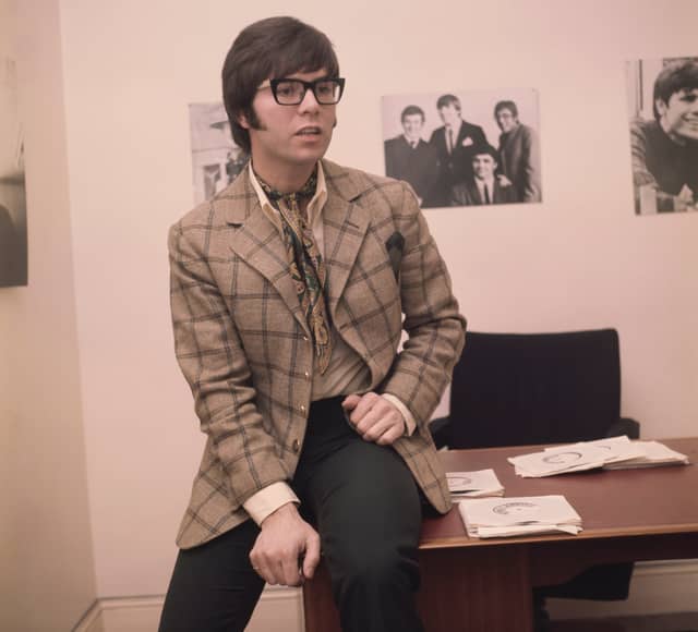 A young Cliff Richard is seen here in around 1970, wearing horn-rimmed spectacles, a windowpane check jacket and a paisley cravat