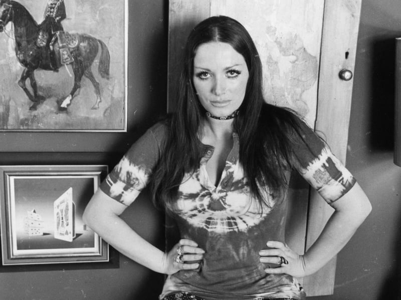 The novelist Jackie Collins is pictured here in 1971, wearing a tie-dye T-shirt and patterned leggings