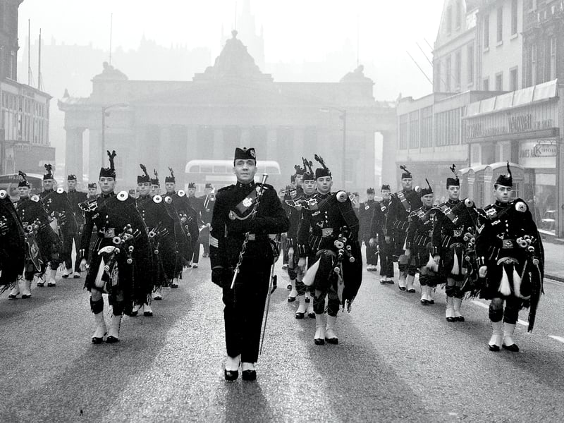 The 2nd Battalion of the Cameronians march up Hanover Street to the Assembly Rooms to play at an exhibition for disabled ex-servicemen in November 1960.