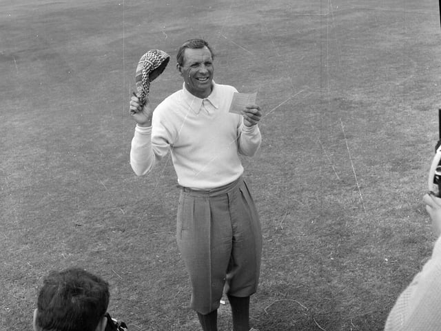 Max Faulkner walks off the 18th green at the 1960 Open Championship at the St Andrews Old Course.