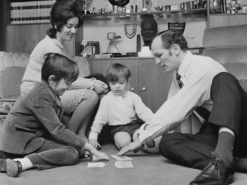Most youngsters enjoyed playing cards with their families in the 70s and 80s. As well as traditional games like Snap and Go Fish, the 70s saw the launch of Uno and Top Trumps. The heavyweight boxer Henry Cooper is pictured here enjoying a game of cards with his family.