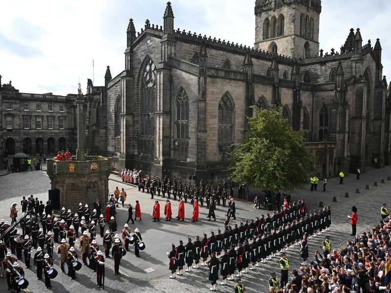 St Giles' Cathedral, or the High Kirk of Edinburgh, is one of the three cathedrals in Edinburgh. The current building was begun in the 14th century and extended until the early 16th century; significant alterations were undertaken in the 19th and 20th centuries, including the addition of the Thistle Chapel. King Charles III attended a service to mark his coronation in 2023 where he was presented with the Scottish crown jewels.