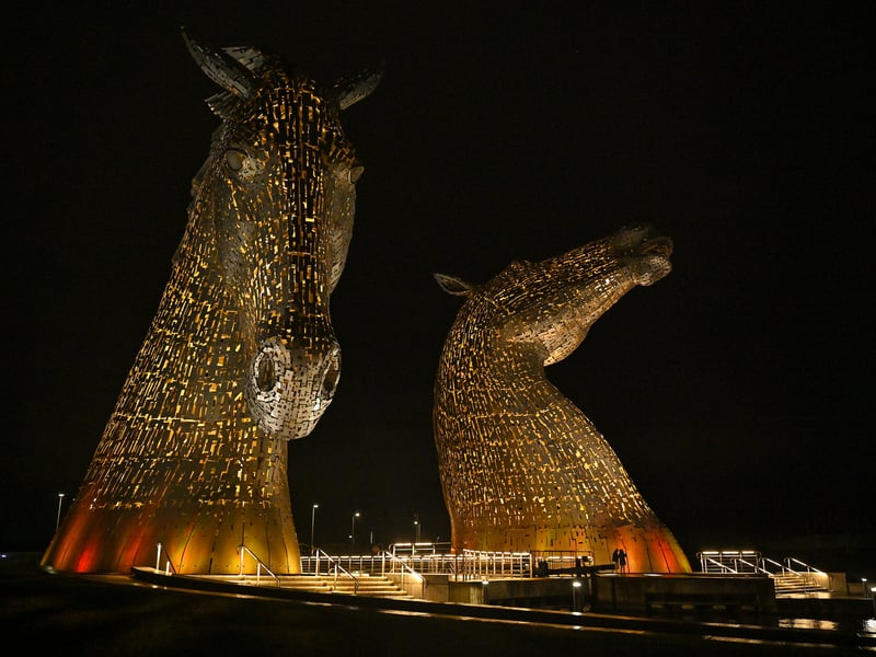 The Kelpies are a pair of monumental steel horse-heads between the Scottish towns of Falkirk and Grangemouth. A kelpie is a shape-changing aquatic spirit of Scottish legend. Produced by Glaswegian sculptor Andy Scott, each head took 75 days to construct as summer 2013 gave way to autumn and by spring 2014, the whole site was ready to welcome visitors.