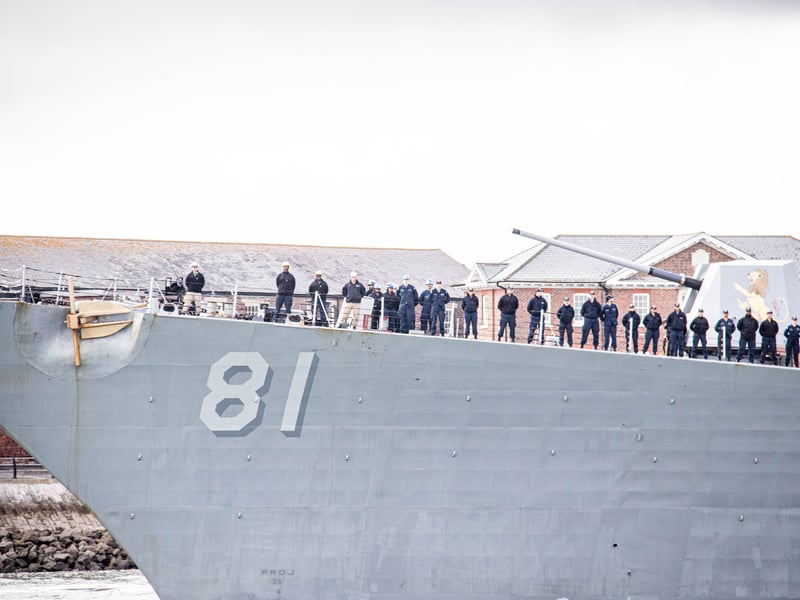Crew of USS Winston S Churchill lined up on the vessel.