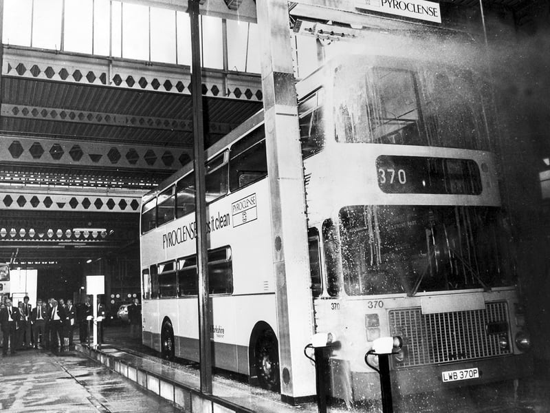 A bus gets a wash in 1976, using a new brushless cleaning system