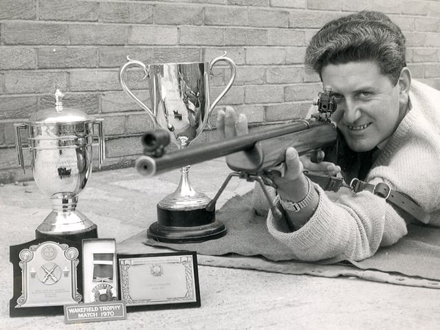 George Lawson who shot for Scotland and Great Britain shows off his trophies in 1970 at Bisley.