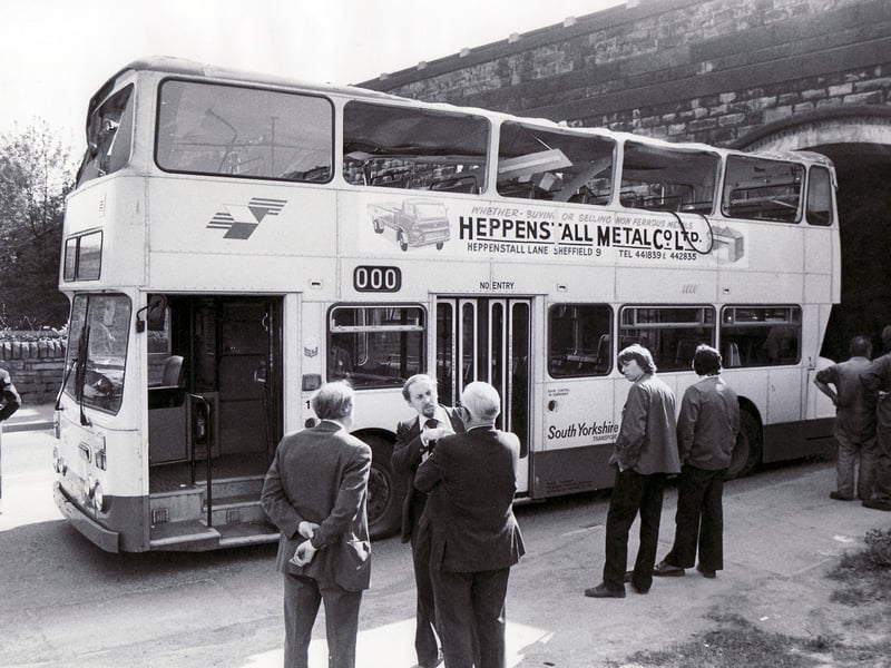 The double-decker bus had to be rescued after it was driven under a low bridge in May 1980. The tyres had to be deflated to release the vehicle, and the roof was badly damaged.