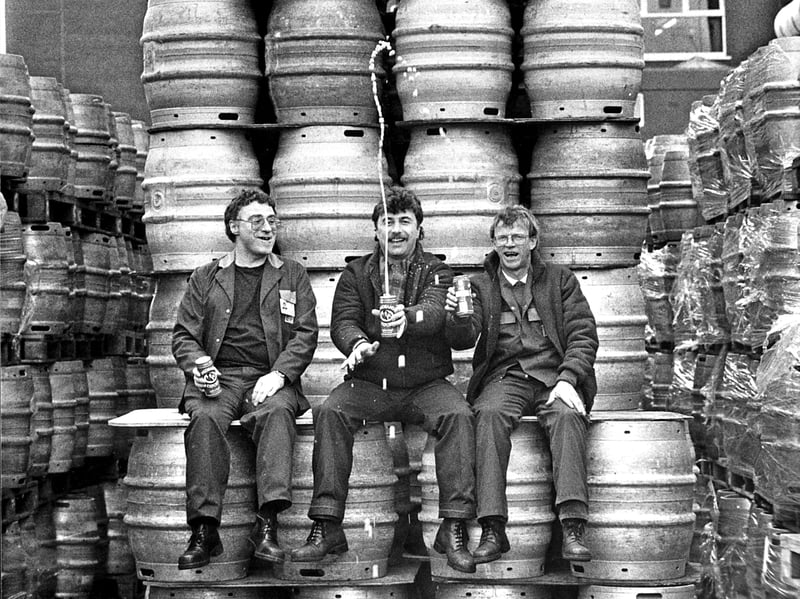 Fountain Brewery workers Harry Traunter, John Smith and Tom Owens celebrate in March 1989