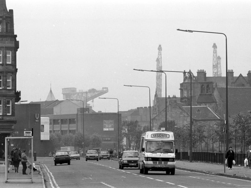 Cesidio's ice cream van in Govan, Glasgow, with the shipyard cranes in the background, in October 1988.