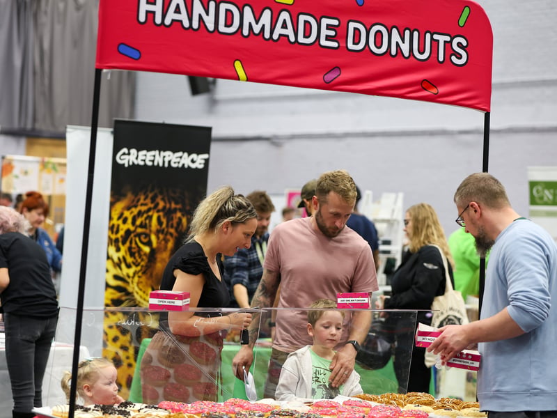 Choosing donuts at the Portsmouth Vegan Festival
