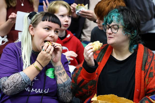 Sam Whitehead and Molly Davis tuck in to some delicious treats at the Portsmouth Vegan Festival.