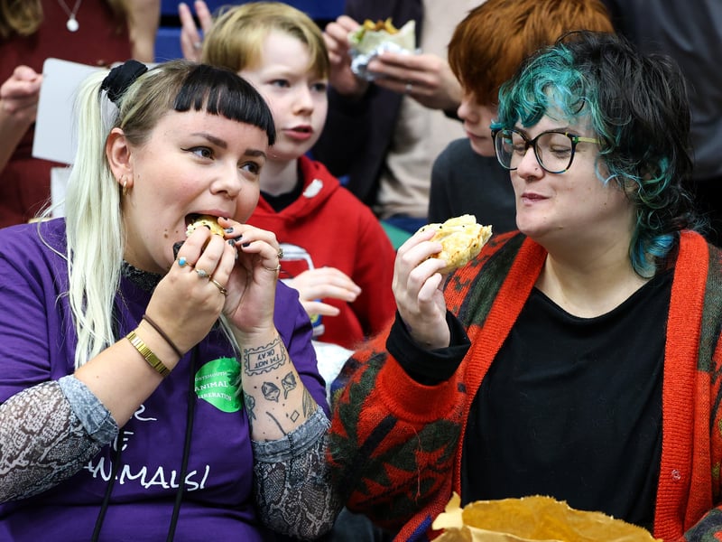 Sam Whitehead and Molly Davis tuck in to some delicious treats at the Portsmouth Vegan Festival.