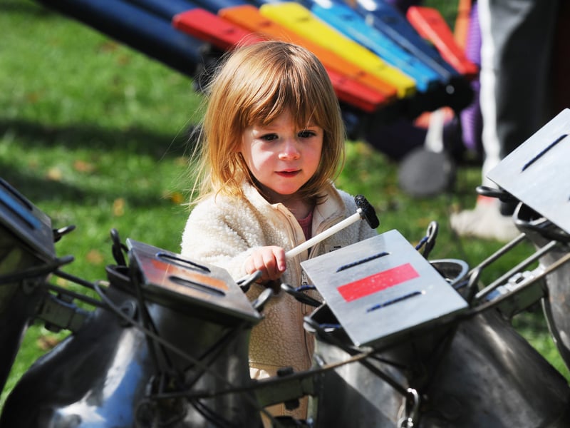 Olivia Pawley, two, of Bramhope having fun at the Orchestra of Objects.