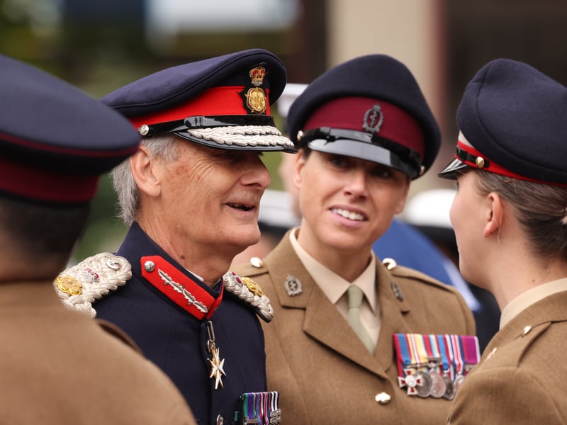Lord Lt Atkinson, the personal rep for HM the King, speaking with soldiers on parade as JHGS is awarded the Freedom of the City.