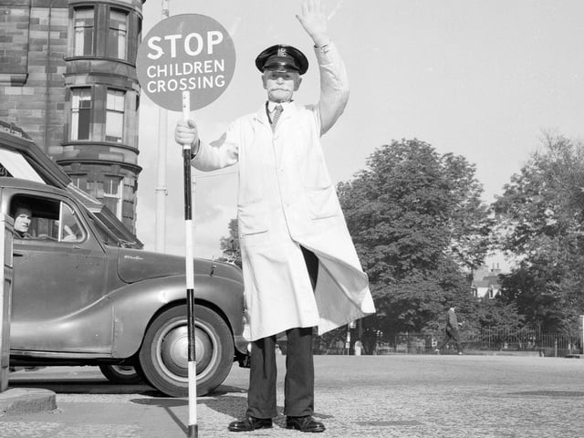 John Thomson, a lollipop man on Morningside Road, in December 1964.