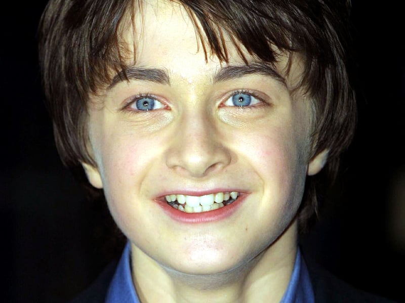 A young Daniel Radcliffe arrives for the world premiere of Harry Potter and the Philosopher's Stone, in which he plays the boy wizard, in November 2001