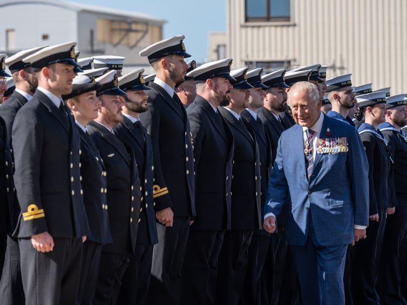 His Majesty The King inspects Royal Navy personnel at the commissioning ceremony of HMS Agamemnon in Barrow-in-Furness (22/09/2025). 