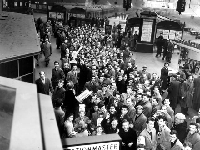 Hibs fans queue at Edinburgh's Princes Street Station for the special train to Glasgow in March 1959. It was to end in disappointment though as the Scottish cup tie ended in a 2-1 win for Third Lanark.