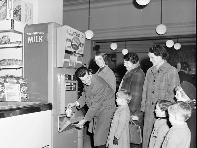 A modern milk machine at J R Allans food store on South Bridge, Edinburgh, in September 1959.