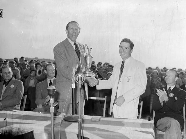 The British Open 1959 Championship winner Gary Player receives the Claret Jug from Mr R Carnegie.