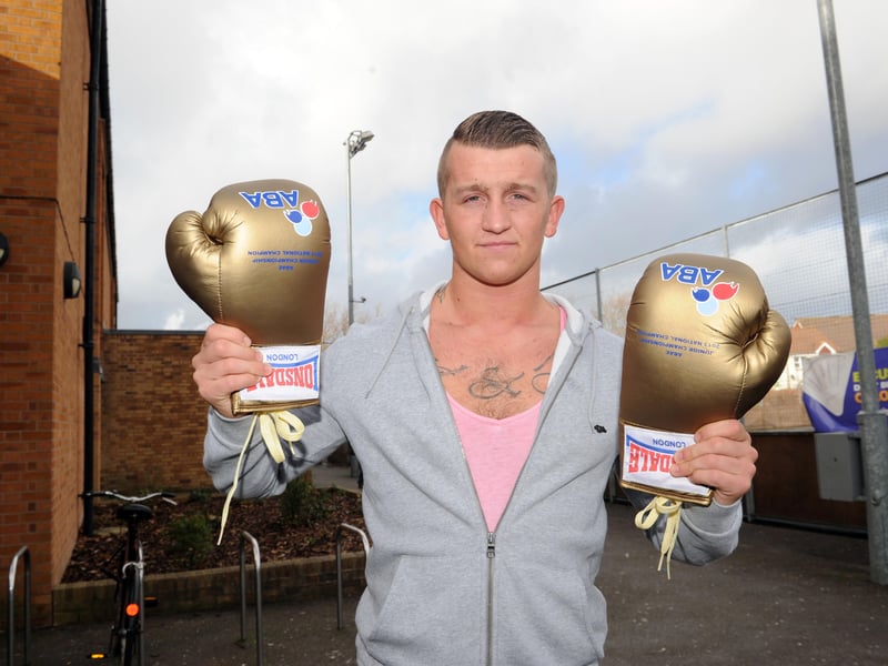 Ben Bendle, of The Heart of Portsmouth Boxing Academy, was presented with some golden gloves by Keith Walters, president of the Amateur Boxing Association, in 2014.