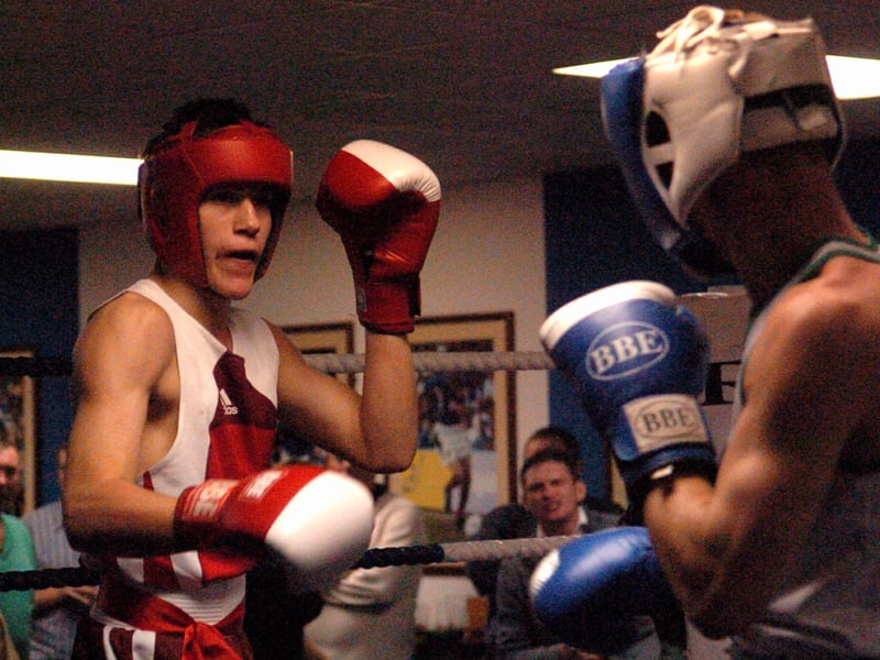 Portsmouth's Ashley Leigh, left, takes on B Buchanan at the City of Portsmouth boxing show at Fratton Park in 2005.