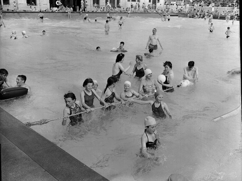 Children on their summer holidays enjoying Portobello open air pool  in 1959.
