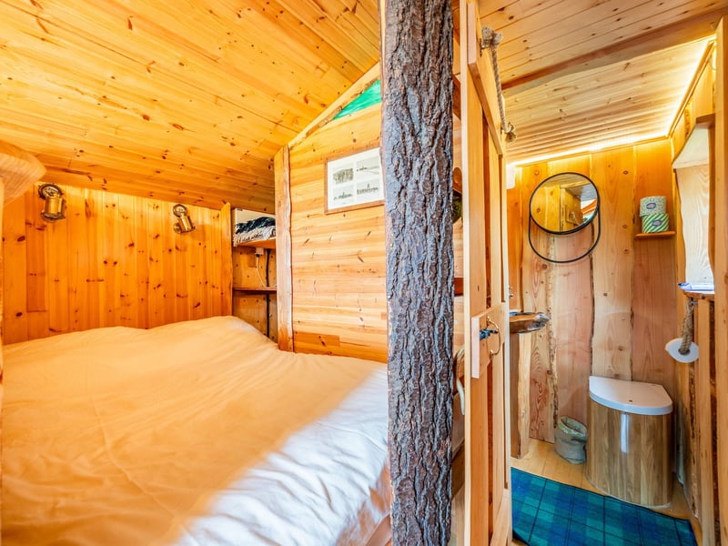 The cabins have been built by a local craftsman. Here, we get a glimpse inside one of the bedrooms.