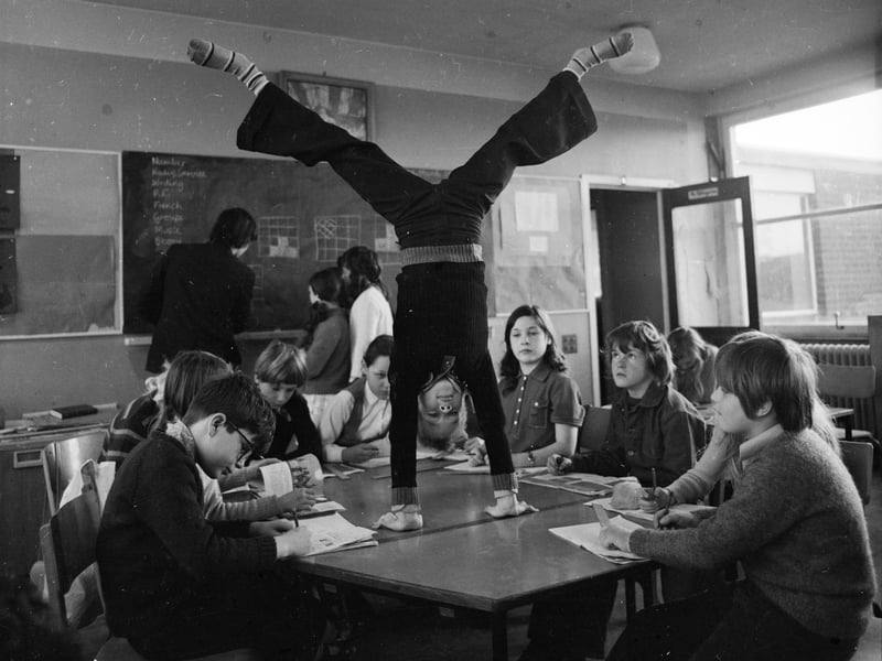Many children of the 60s and early 70s recall the 'Music and Movement' radio series, which was broadcast by the BBC and played at schools around the country. Presenters with plummy voices would encourage children to sway like a tree or trot like a horse, with the instructions set to music. We couldn't find any pictures of 'Music and Movement' in action, but we love this photo of a child performing a handstand on a desk to apparent indifference from their fellow pupils.