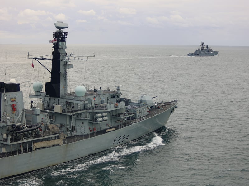 HMS Iron Duke shadows RFN Neustrashimy and cargo ship Sparta IV as they sail through the English Channel.