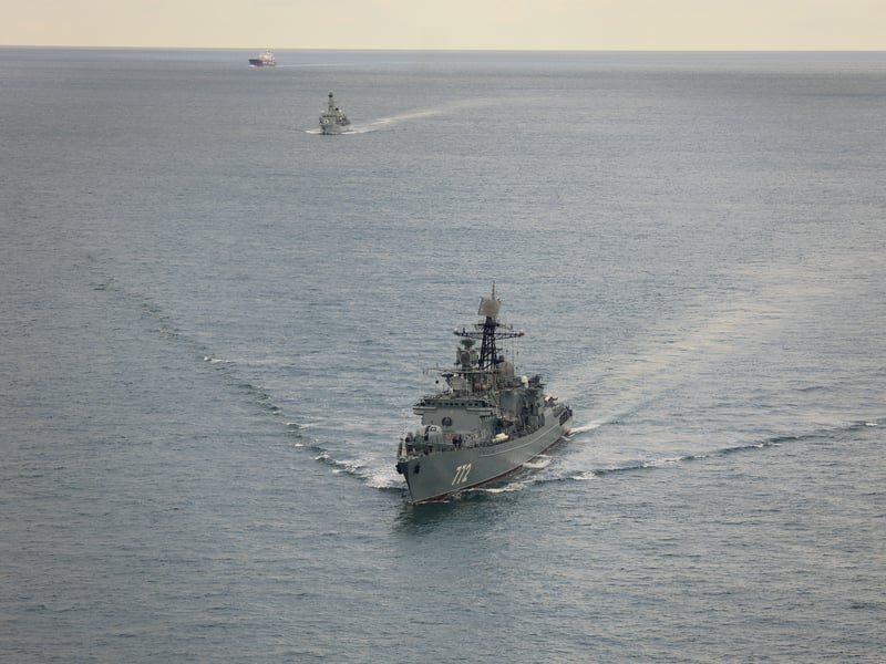 HMS Iron Duke shadows RFN Neustrashimy and cargo ship Sparta IV as they sail through the English Channel.