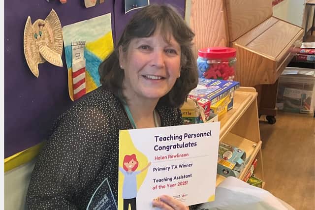 Helen smiling after receiving her award