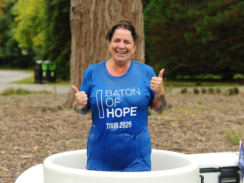 Baton bearer Suzie Dennett who braved the ice bath after her leg of the journey at Victoria Park.