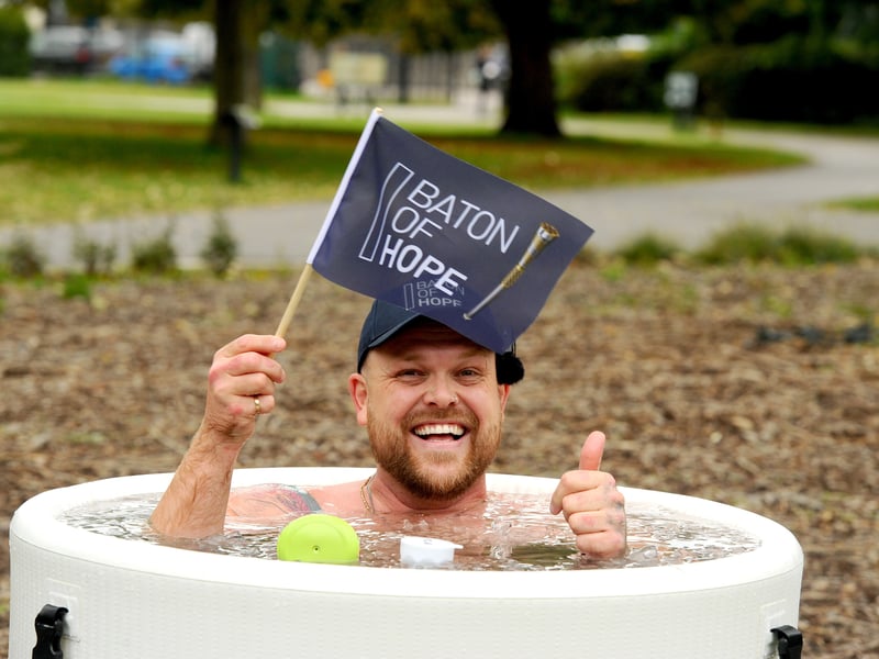 Harry Beattie otherwise known as Ice Bath Harry takes his daily ice bath in Victoria Park in support of the Baton of Hope procession.