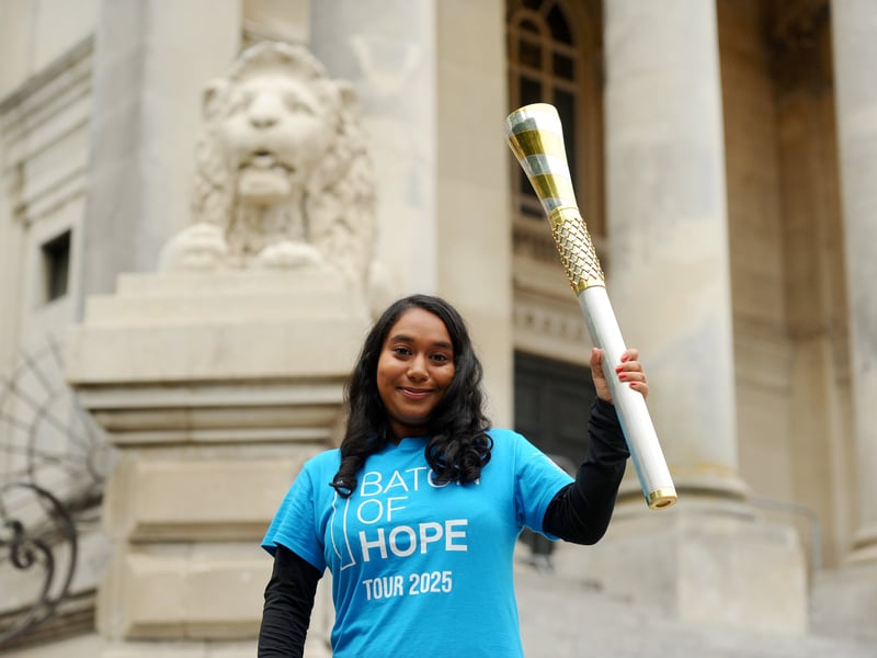 Baton bearer Maya Choudhury (16) at Portsmouth Guildhall.