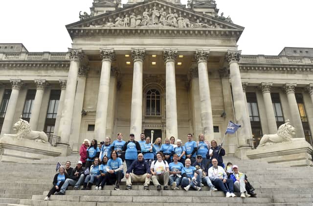 Baton of Hope volunteers on the steps of Portsmouth Guildhall.