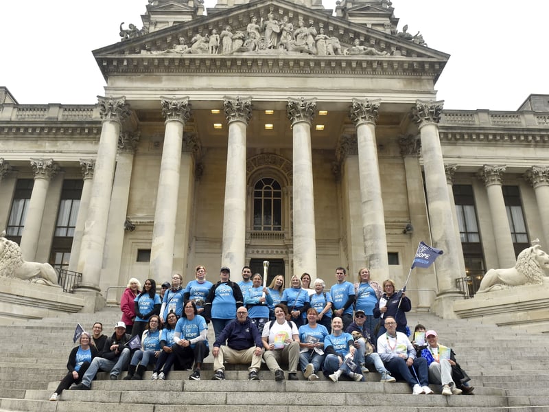 Baton of Hope volunteers on the steps of Portsmouth Guildhall.