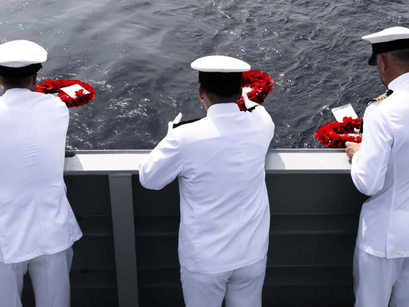 HMS Prince of Wales hosts a remembrance service and committal of wreaths over the site of the wrecks of the battleships HMS Prince of Wales and HMS Repulse. Japanese sailors supported their British counterparts with the commemoration.