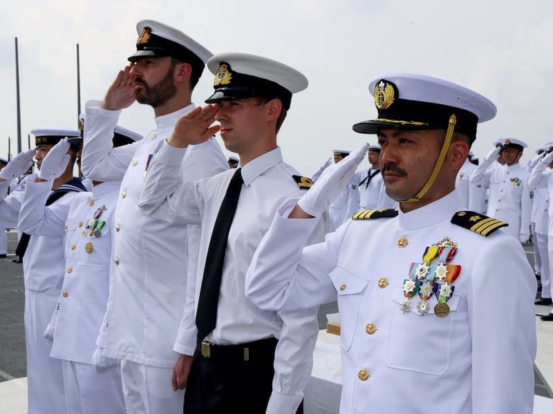 A small group of Military Personnel embarked onto Japanese Ship Akebono to take part in a service of remembrance and Committal of Wreaths over the site of the wrecks of HMS Prince of Wales and HMS Repulse which were sank by enemy torpedoes on December 10th 1941.