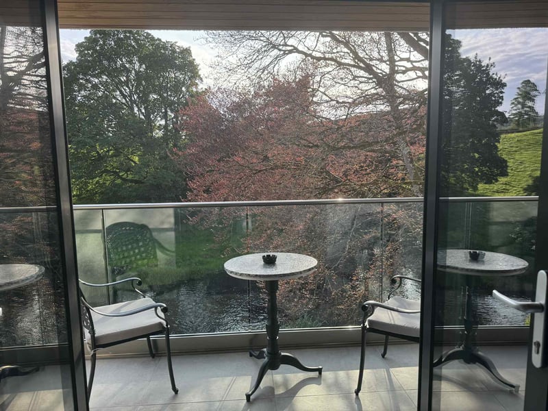 Step out onto your private balcony and take in the peaceful riverside views.